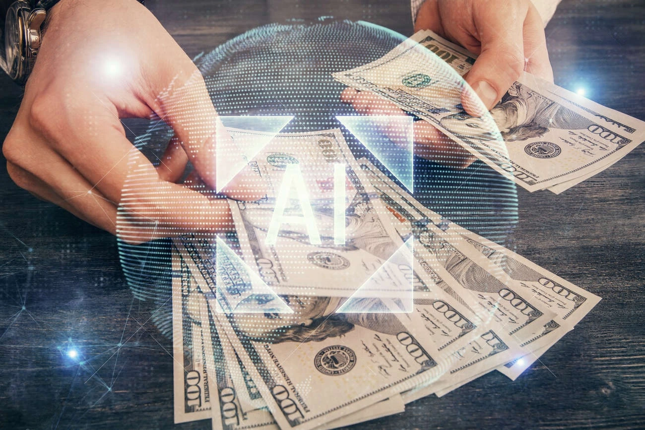 A person counts US hundred-dollar bills on a table, with a digital overlay displaying"AI" and abstract tech graphics—perfect for showcasing the power of an AI caption generator in financial settings.